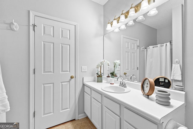 bathroom featuring vanity and tile patterned floors