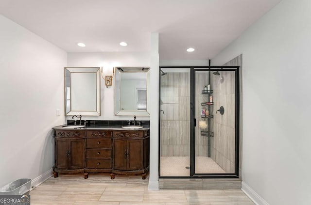 bathroom with vanity and an enclosed shower