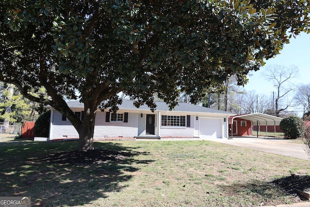 ranch-style home featuring an attached garage, driveway, brick siding, and a front yard