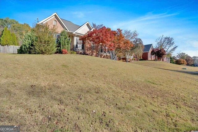 view of front of home with a front lawn