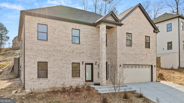 view of front of home with a garage