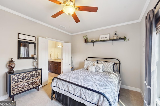 bedroom with ceiling fan, connected bathroom, ornamental molding, and light carpet