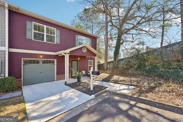 view of front of property with a garage