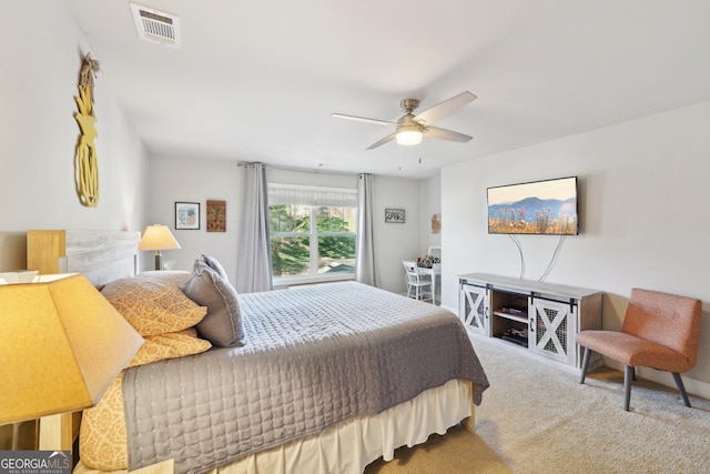 bedroom featuring ceiling fan and carpet floors