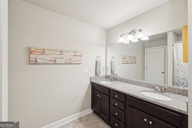 bathroom with vanity and tile patterned flooring