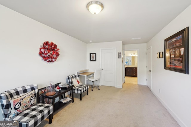 sitting room with light carpet