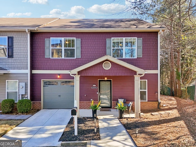 view of front of property with a garage