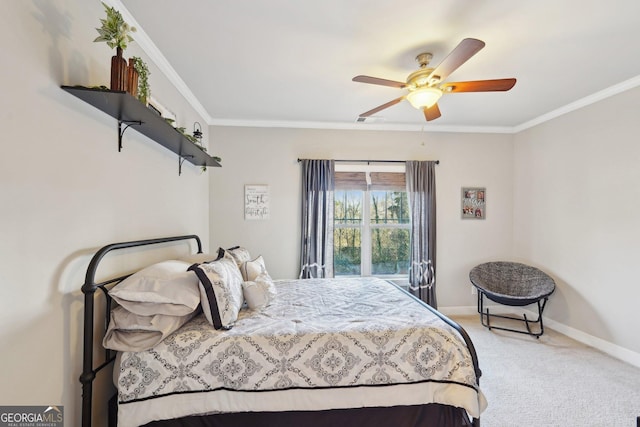 bedroom with crown molding, carpet flooring, and ceiling fan