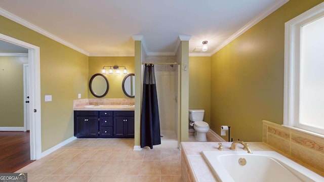 full bathroom with tile patterned floors, toilet, ornamental molding, and vanity