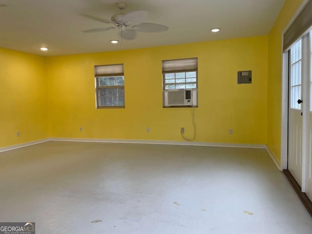 unfurnished room with electric panel and ceiling fan