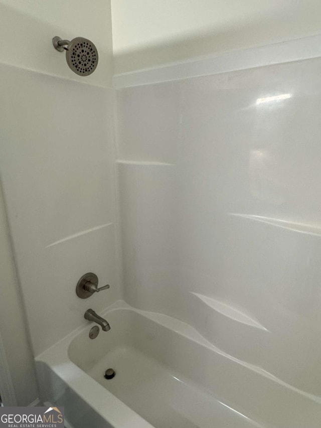 bathroom featuring shower / bath combination