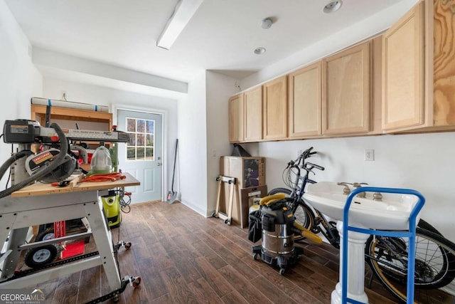 washroom with dark hardwood / wood-style flooring