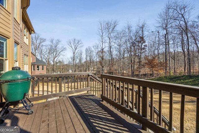 wooden deck with area for grilling