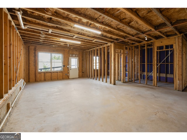 misc room with concrete floors