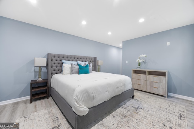 bedroom featuring hardwood / wood-style flooring