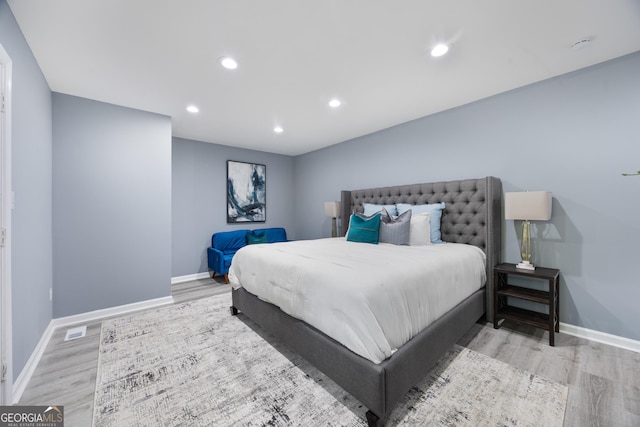 bedroom with light hardwood / wood-style flooring