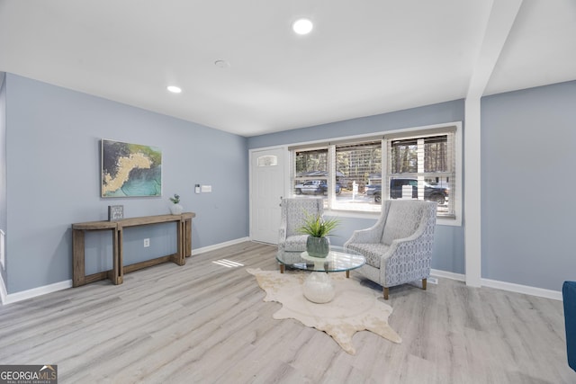 living area with light wood-type flooring