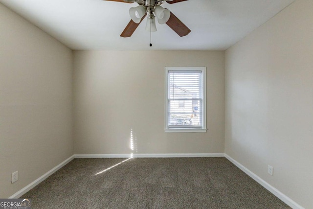 empty room with dark carpet