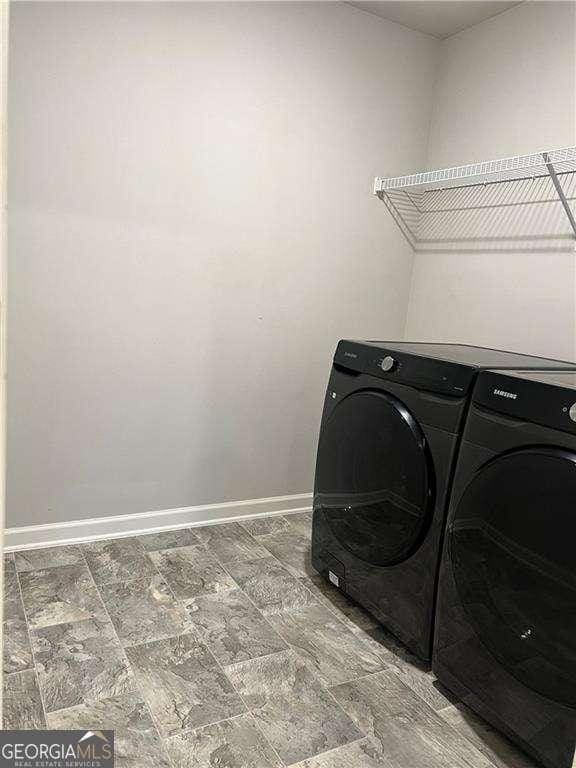 washroom featuring separate washer and dryer