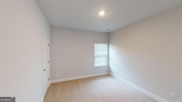 empty room with light carpet