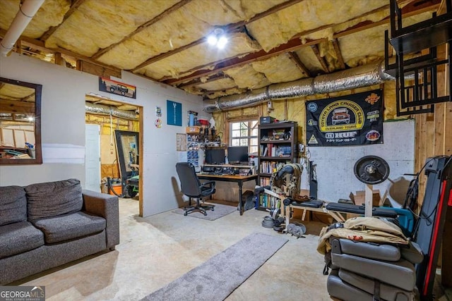 office area featuring concrete floors