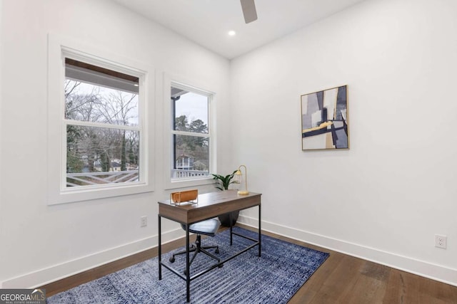 office area with hardwood / wood-style flooring and ceiling fan