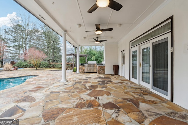 view of patio / terrace featuring area for grilling and ceiling fan