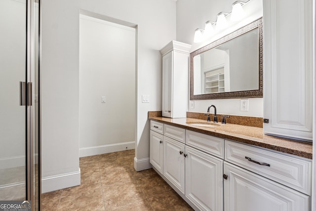 bathroom featuring vanity and tile patterned floors