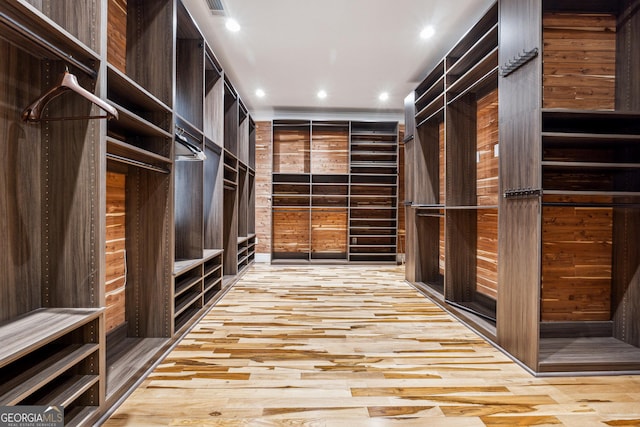 walk in closet featuring light wood-type flooring