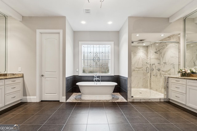 bathroom featuring vanity, separate shower and tub, and tile patterned floors