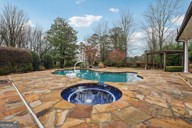 view of swimming pool with a pergola, a patio, and an in ground hot tub