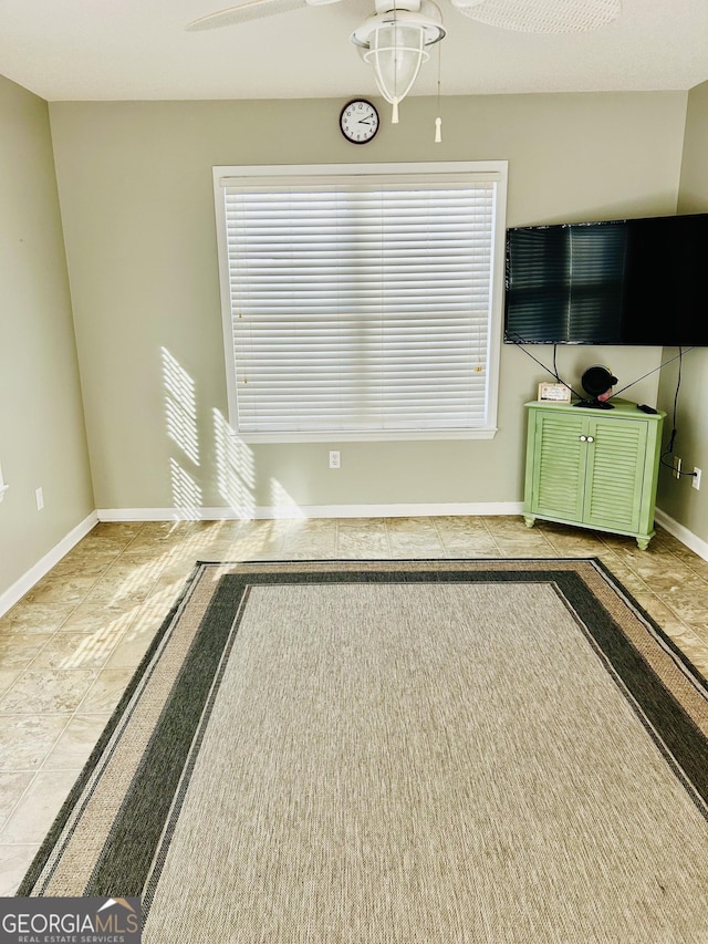 unfurnished living room featuring a wealth of natural light