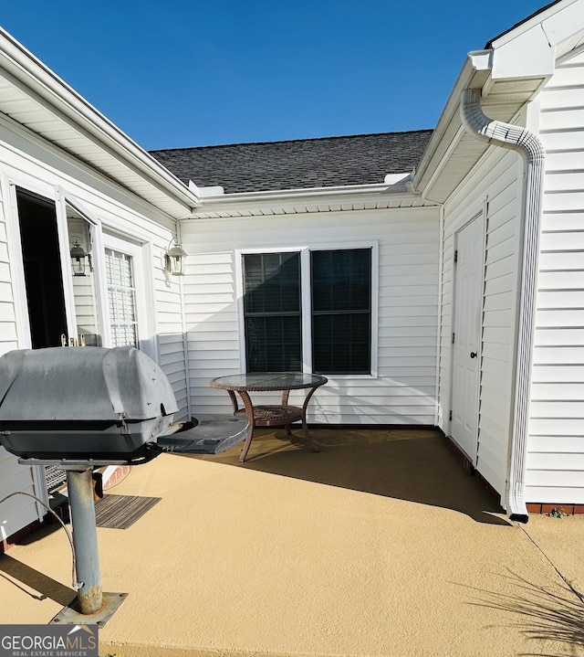 view of patio with a grill