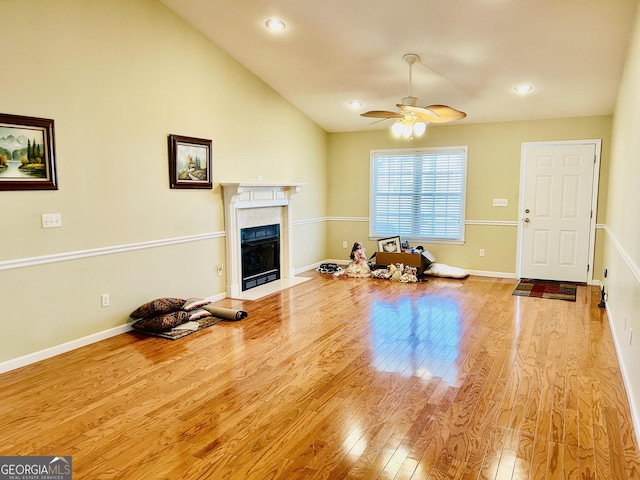 interior space featuring vaulted ceiling, ceiling fan, and light hardwood / wood-style flooring