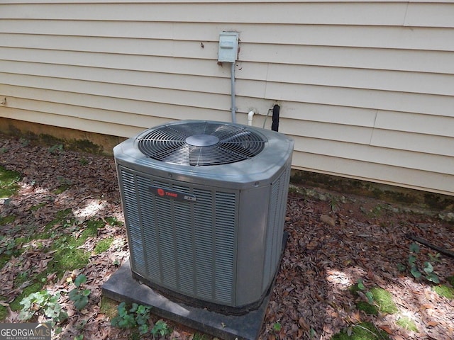 exterior details featuring cooling unit