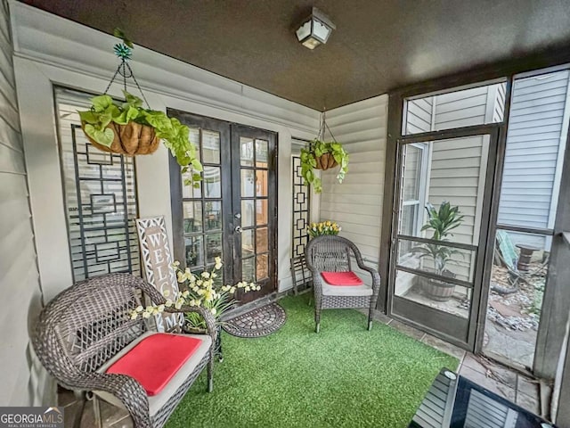 sunroom / solarium with french doors