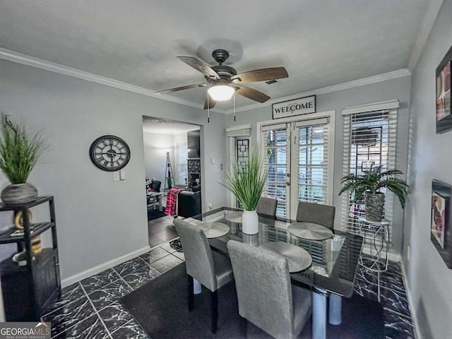 dining space featuring ceiling fan, french doors, and ornamental molding