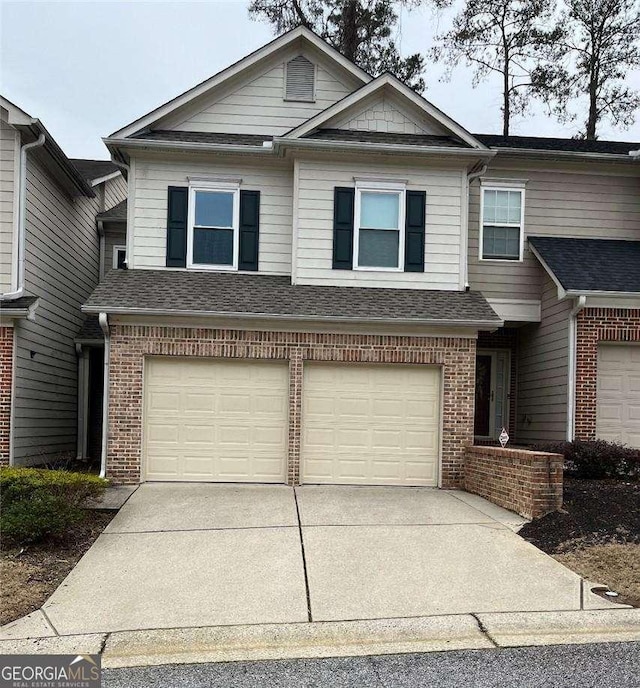 view of front of home with a garage