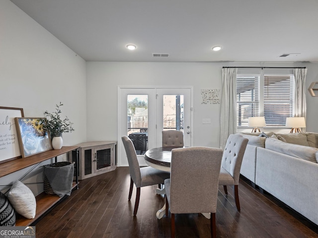 dining room with dark wood-type flooring