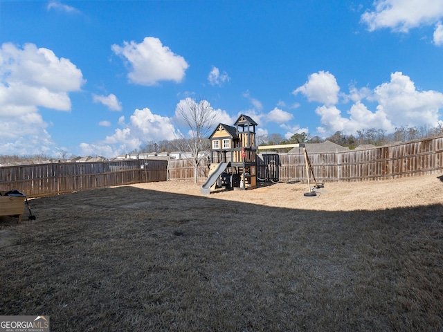 view of jungle gym with a yard