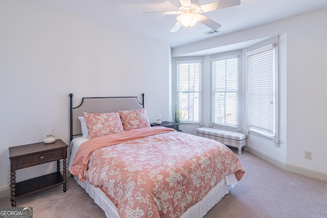 carpeted bedroom featuring ceiling fan