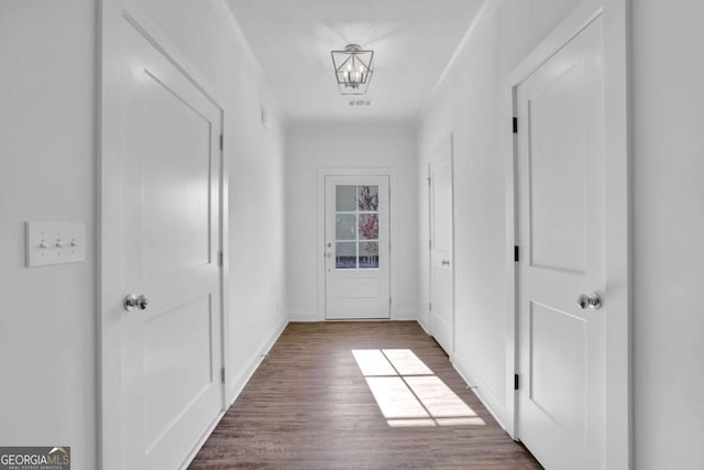 corridor featuring hardwood / wood-style flooring