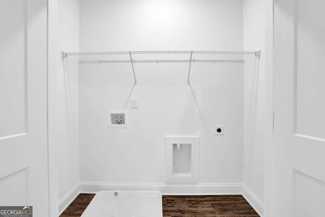 washroom with electric dryer hookup, dark hardwood / wood-style flooring, and hookup for a washing machine