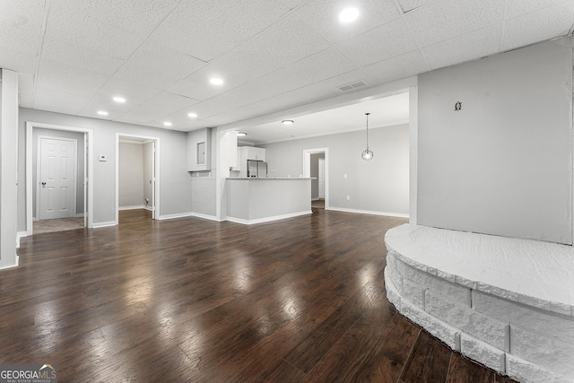 living room featuring dark wood-type flooring