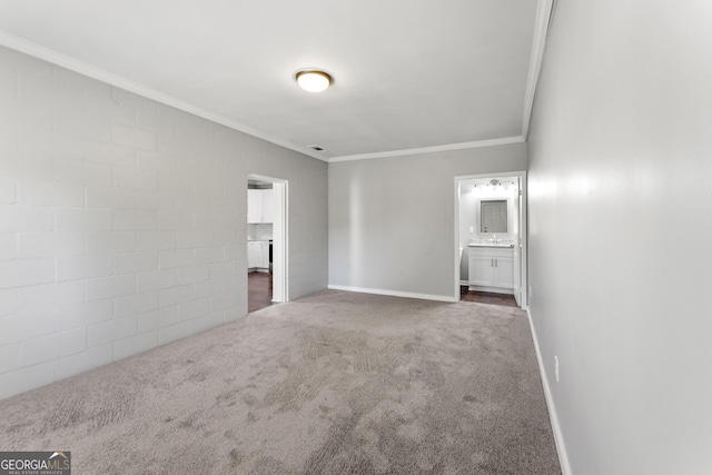 unfurnished room with dark carpet and ornamental molding