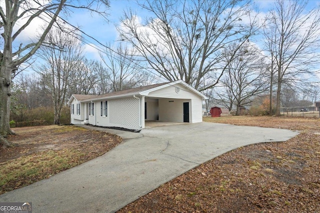 view of home's exterior with a carport