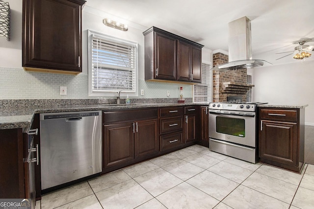 kitchen with crown molding, appliances with stainless steel finishes, sink, and island range hood