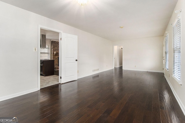 empty room with light hardwood / wood-style floors