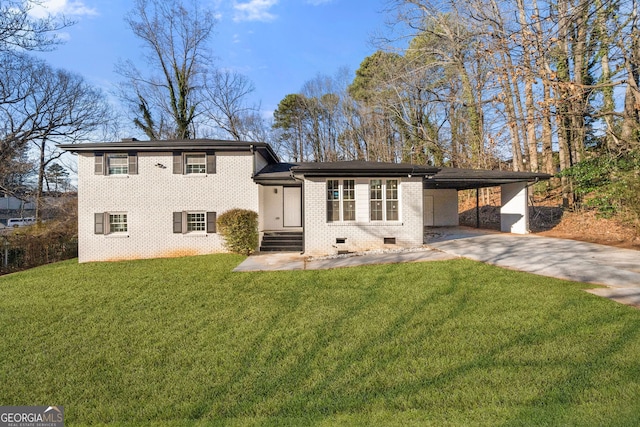 split level home featuring a front yard and a carport