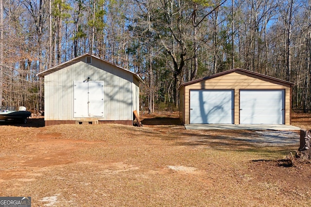 view of outbuilding with a garage